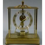 A Kienginger & Obergfell Kundo gilt metal and glass cased clock c.1960s skeleton movement,