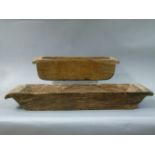 Two wooden troughs, 54cm long x 16cm wide x 14.5cm high, 73cm long x 22cm wide x 10cm high