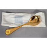 Georg Jensen, a .925 silver gilt year spoon for 1973 with corn marigold motif in yellow enamel, 15cm