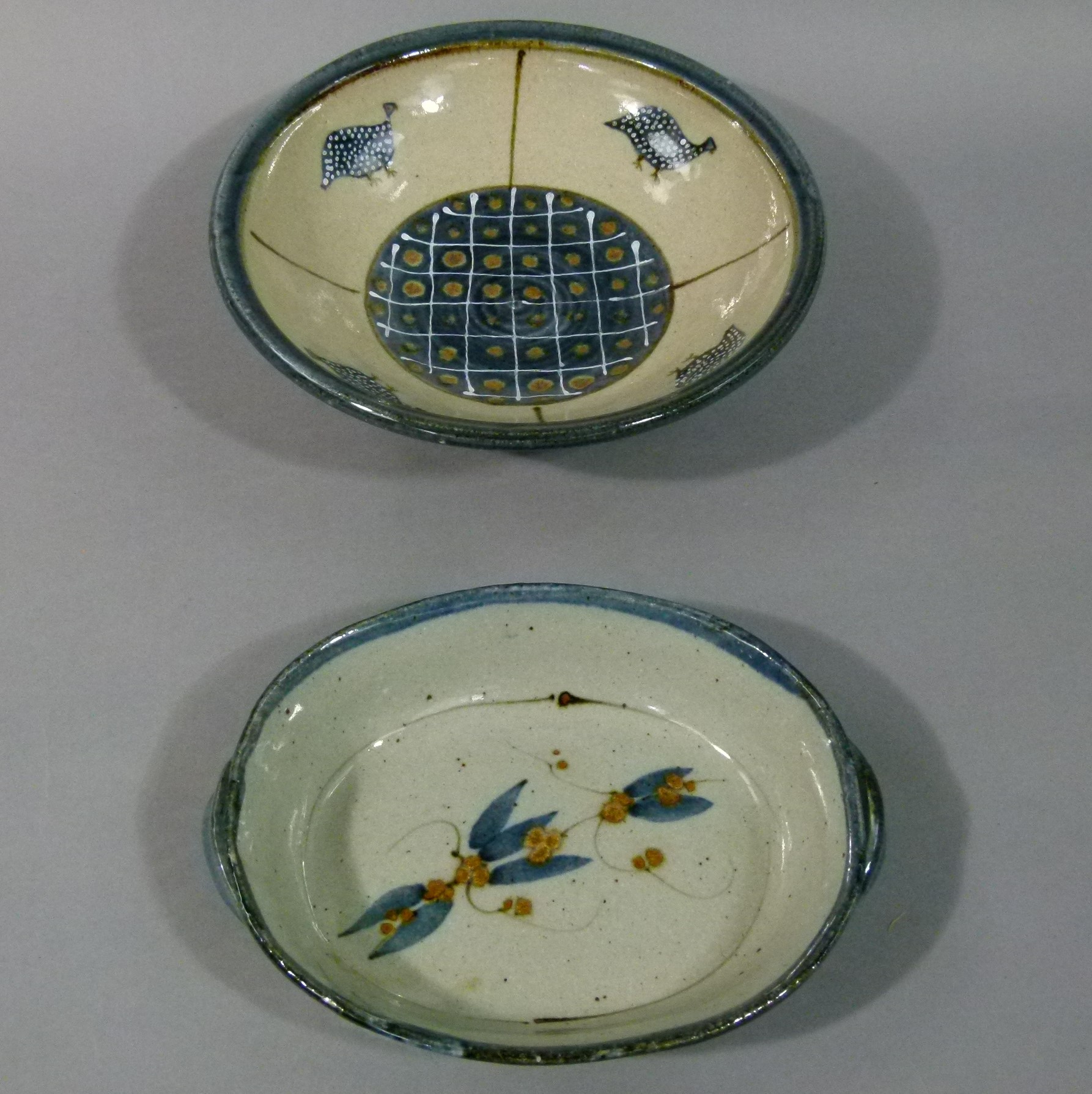 A stoneware bowl, painted with four guinea fowl in blue, brown and white, clear glaze and a two - Image 2 of 3