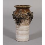 Glit Lava, Iceland, 20/21st century, a pottery, pumice and lava rock vase, in shades of brown,