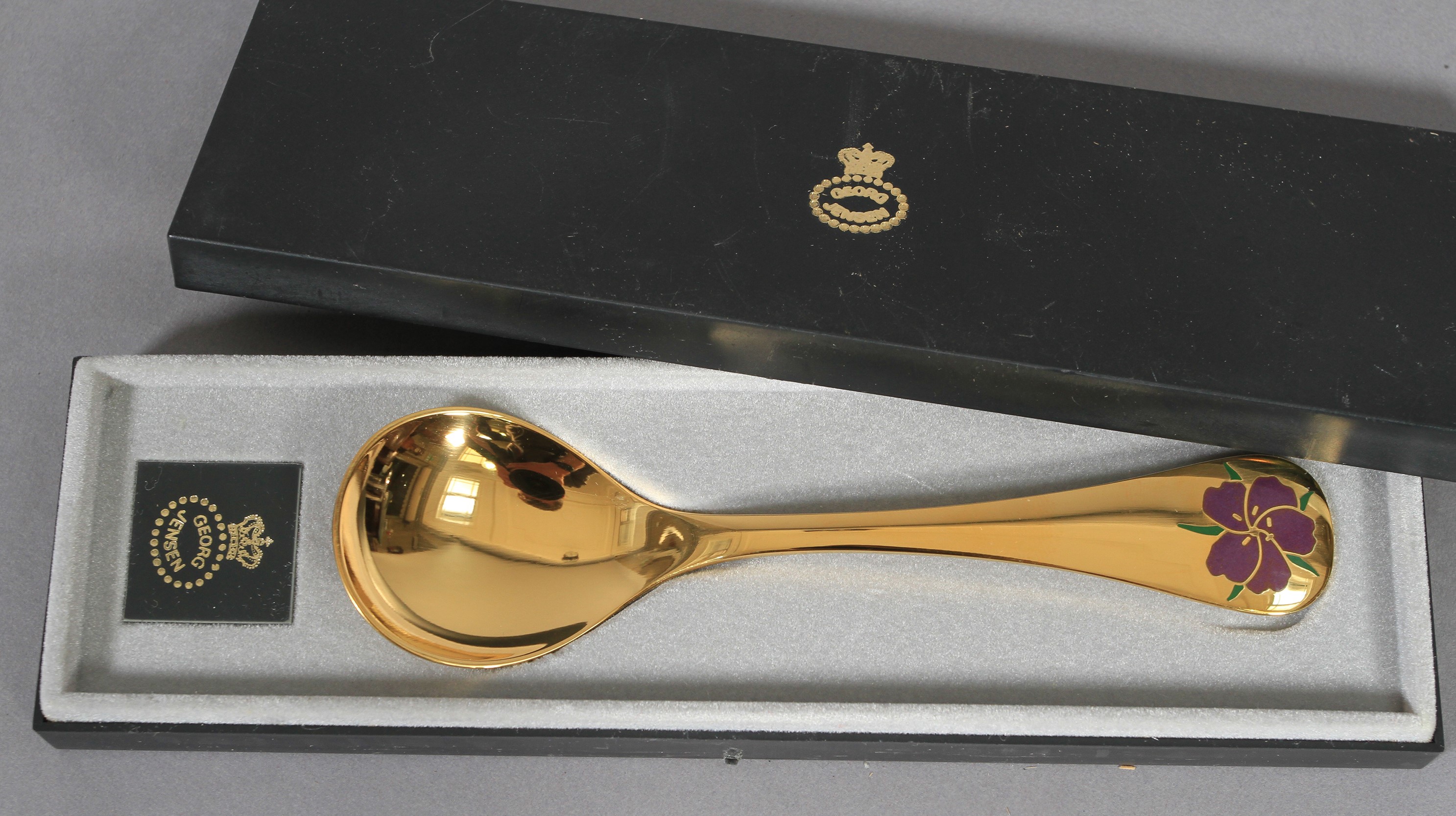 Georg Jensen, a .925 silver gilt year spoon for 1 974 with corn cockle motif in aubergine and