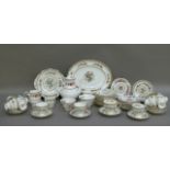 A Coalport Ming Rose tea service, approximately forty pieces comprising an oval platter, smaller