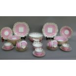 An Aynsley Pink Rose tea service of approximately forty pieces comprising two bread and butter