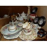A Continental porcelain dressing table tray, lidded jar, ring tree and hair tidy; together with