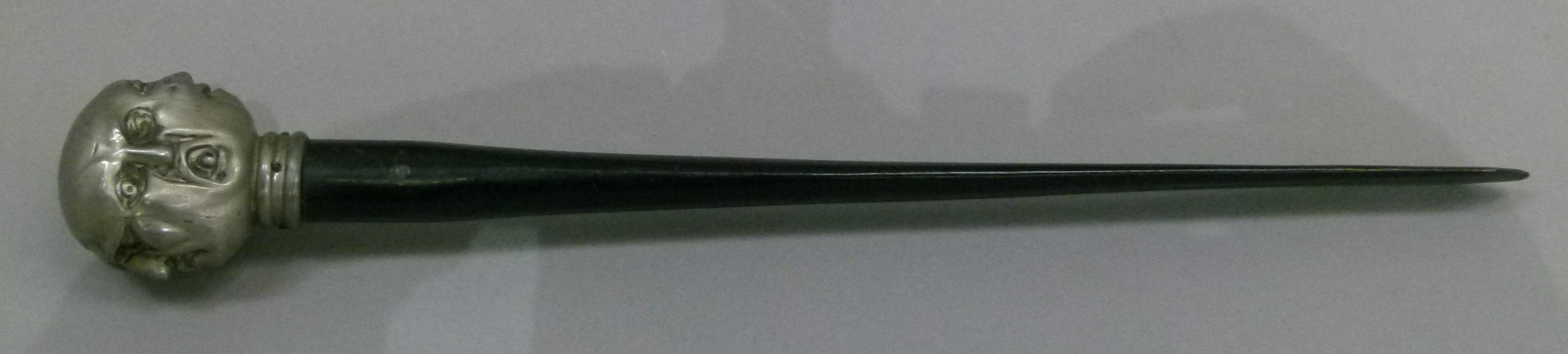 A letter opener with white metal pommel cast as four grotesque faces, 36cm long - Image 4 of 8