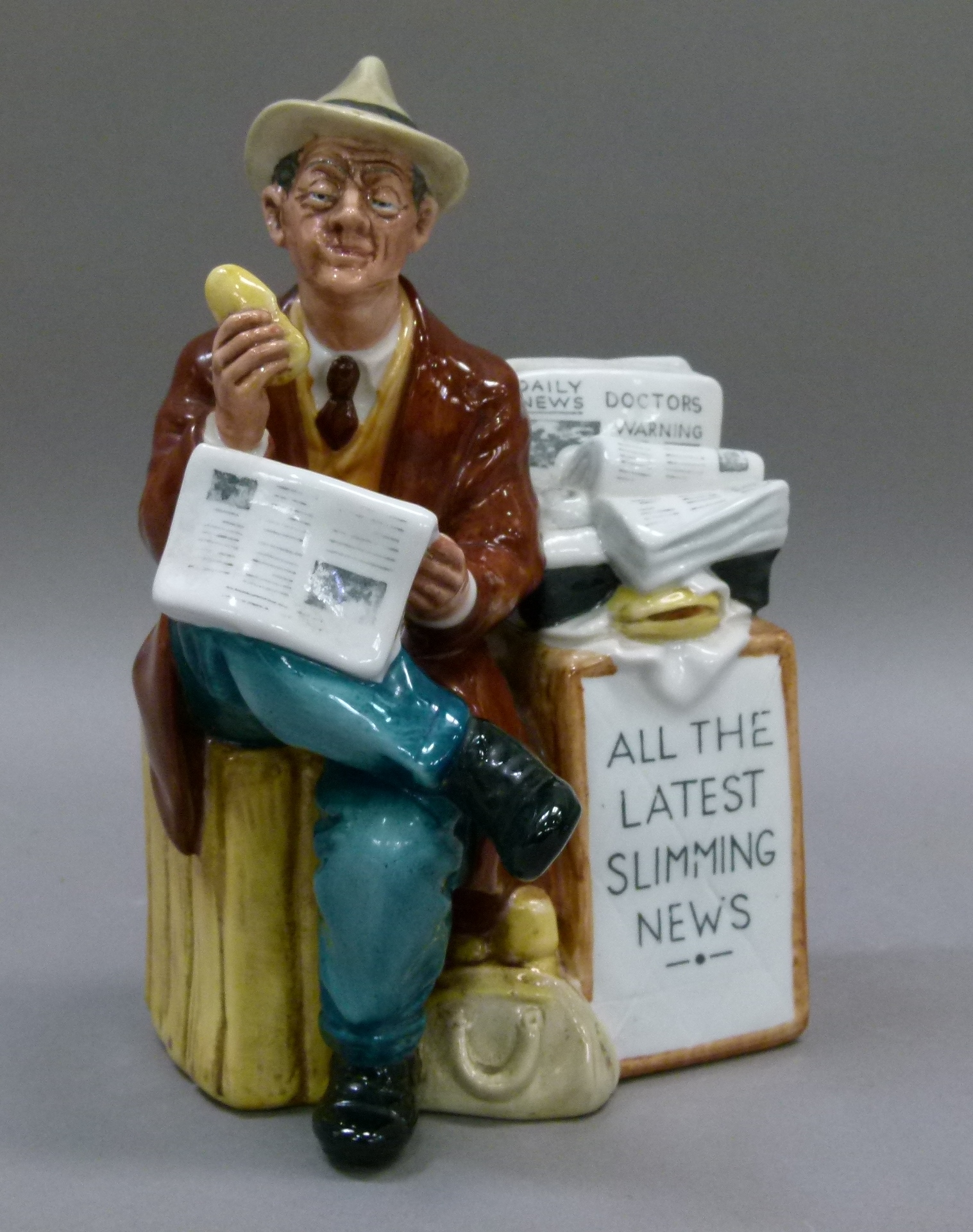 A Royal Doulton figure - 'Stop Press' HN2683, 19cm high, printed mark in green