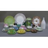 A quantity of decorative ceramics including Continental porcelain Cornucopia centre piece,