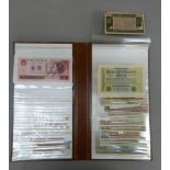An album of approximately 100 obsolete foreign banknotes