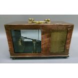 An F Darton & Co copper and brass cased thermograph, 25.5cm wide