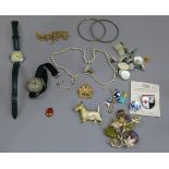 A small collection of mid 20th century costume jewellery including Girl Guide and Red Cross