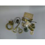 A brass ring door knocker with back plate and a pair of brass ring door handles, 10cm diameter; a