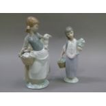 A Lladro figure group of a young girl carrying a lamb on her hip and vegetables in a basket, 25cm