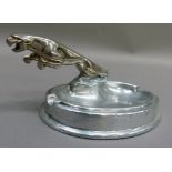 A reproduction white metal jaguar 'ashtray', 16cm wide