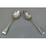 A pair of George IV fiddle pattern table spoons, a pair of Irish George IV fiddle pattern table