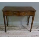 A reproduction mahogany serpentine side table in George III style, boxwood strung, fitted with two