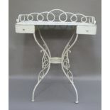 A French white painted metal dressing table/wash stand, the three quarter gallery above two short