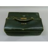 An early 20th century leather valise with twin opening top by J C Vicary of Regent Street, London,
