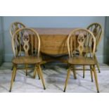 An Ercol elm, drop leaf dining table 113cm x 126cm together with a set of four Windsor style
