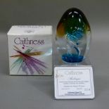 A Caithness Arabesque paperweight designed by Margot Thomson, a limited edition 210/750, 11cm