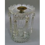 A 19th century cut glass lustre stand with broad serrated cut, drip pan hung, tapered prismatic
