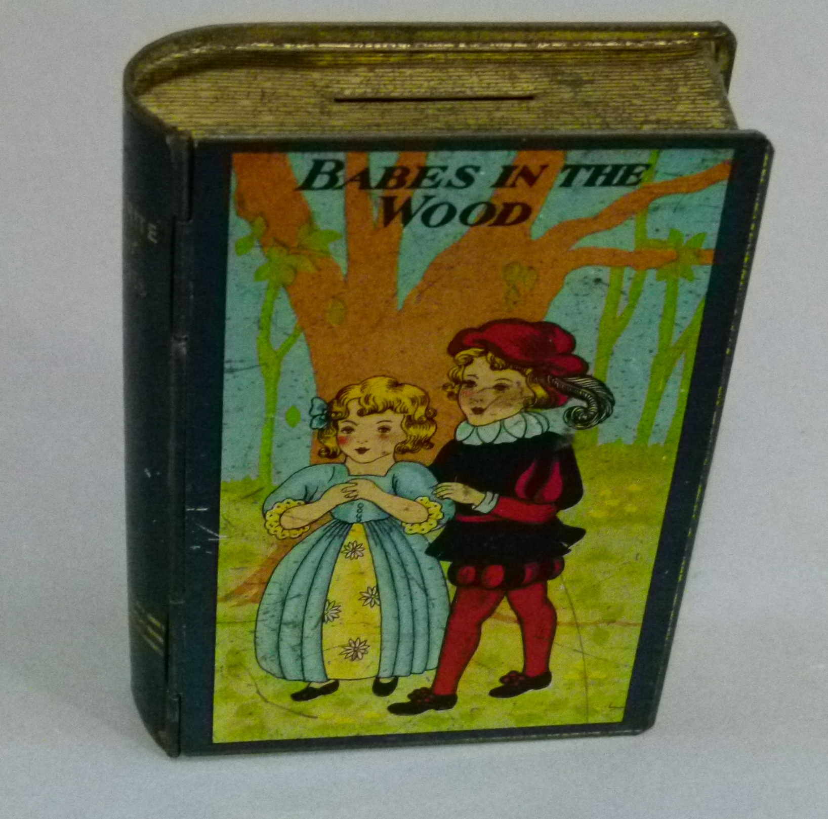 A 'Favourite Fairy Stories, Babes in the Wood' money box in the form of a book, printed tin, 14. - Image 3 of 5