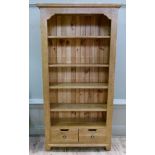Provence - an open book case with stepped flared cornice above four adjustable shelves, the base