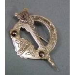 An Irish 9ct gold brooch pierced and engraved in the outline and detail of a plaid pin, hallmarked