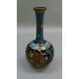 A Japanese cloisonne enamel bottle shaped vase with bulbous body decorated with three shaped