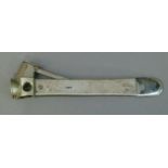 A silver faced steel cigar cutter, 16cm long, indistinct maker's mark London 1972