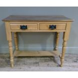 A Victorian pine dressing table/wash stand base, the rectangular top above two short drawers on