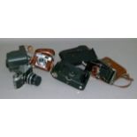 A quantity of vintage cameras including Polaroid, Voigtlander etc