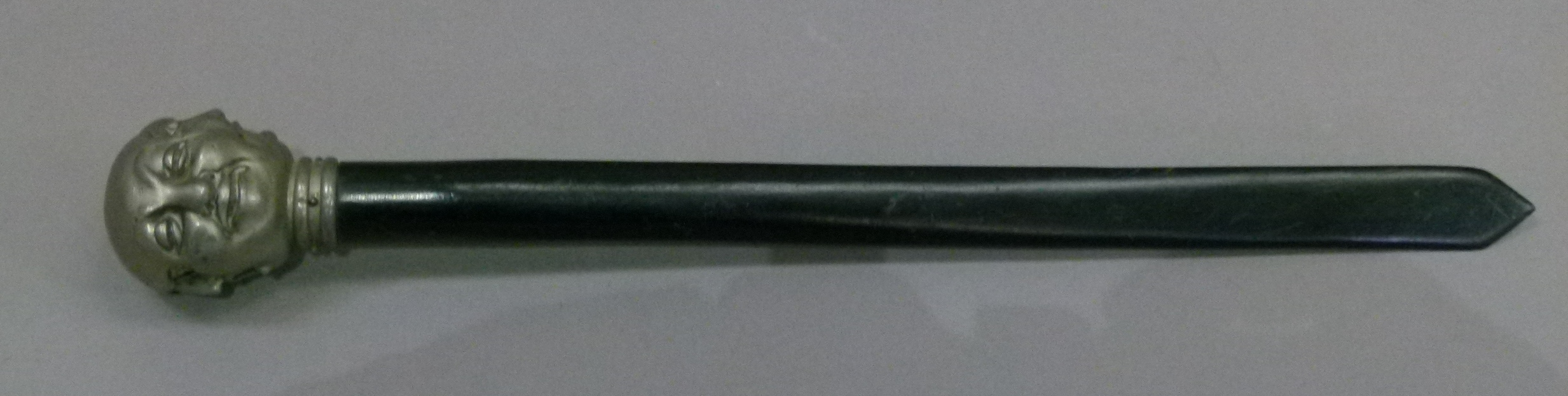 A letter opener with white metal pommel cast as four grotesque faces, 36cm long - Image 3 of 8