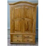 A Provence two drawer wardrobe with moulded arched cornice, pair of raise fielded