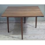 An 19th century mahogany Pembroke table having twin rectangular drop leaves and on square tapered