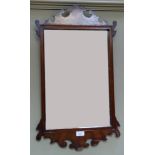 A Vauxhaul style fretted frame mahogany wall mirror, 69cm high