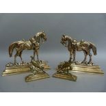 A pair of Edwardian brass door porters cast as horse with saddles and bridles, on stepped