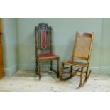 A Victorian oak Jacobian revival hall chair, the pierced carved cresting of lions around a vacant