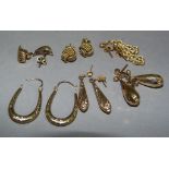 Six pairs of 9ct gold earrings including hoops, knot studs and pendants, total approximate weight