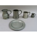A 19th century pewter quart mug baluster form with S scroll handle, together with a Victorian