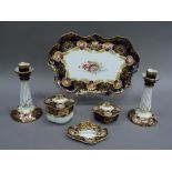 Aynsley porcelain dressing table tray, pair of candlesticks, two lidded boxes and a tray decorated