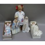 A collection of modern porcelain headed dolls including Marie Antoinette and Princess Grace of