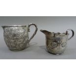 A Victorian silver cream jug embossed with zodiac signs, London 1888, together with a Chinese