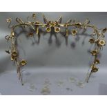 A French gilt foliate and floral illuminated frame with ribbon tied centre and frosted frilled