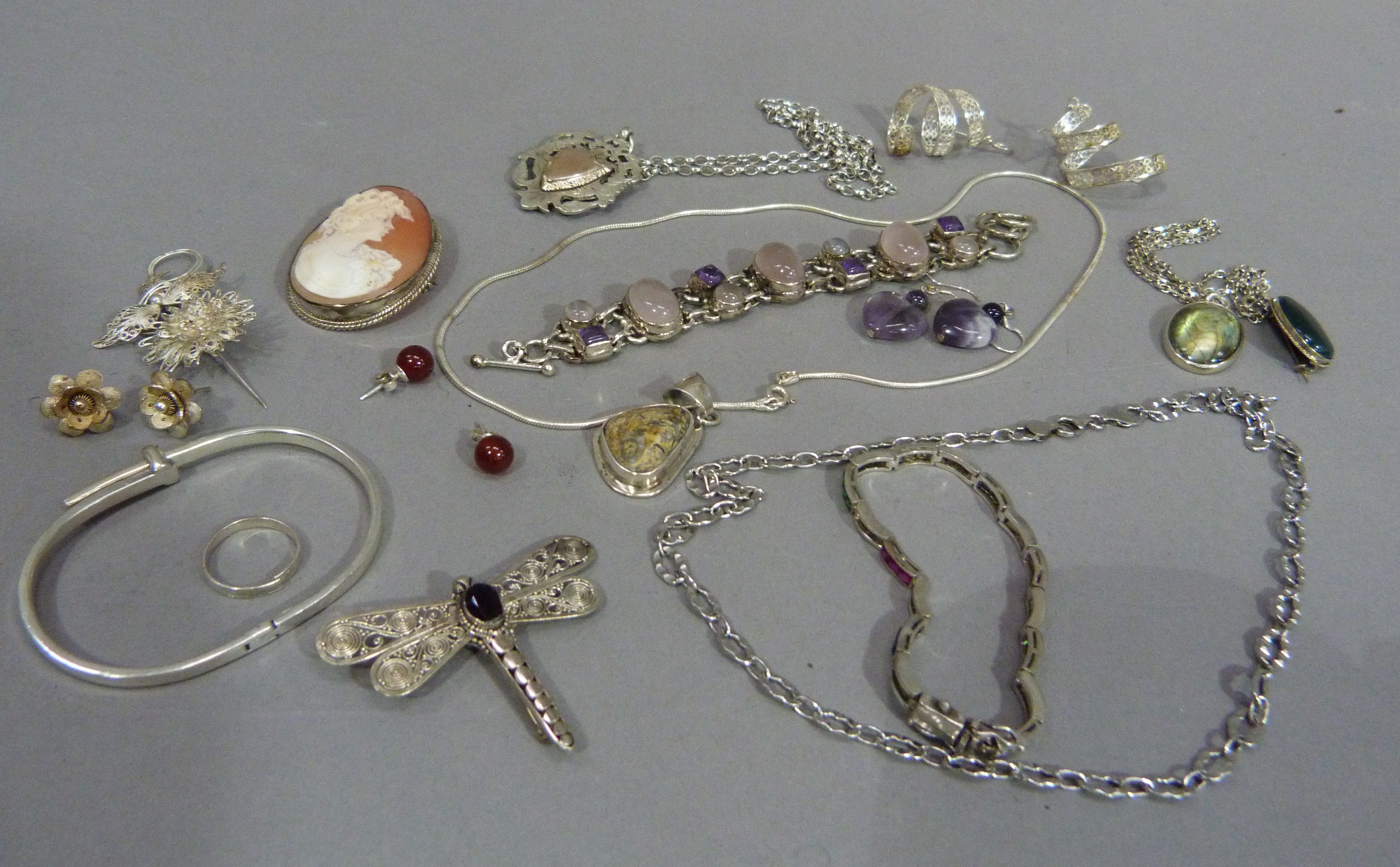 A collection of late 20th century silver jewellery including bracelets, bangles, earrings,