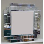 A decorative mirror with stepped square bevelled border plates, 90cm high overall