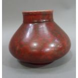 A Minton Hollins & Co, Astra Ware sack shaped vase with cylindrical neck, mottled red glaze, 14cm