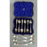 A cased set of six silver coffee spoons, London 1905, together with a set of six silver teaspoons,