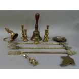 A mahogany handled brass hand bell together with two pairs of miniature table candlesticks, a one
