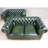 A pair of buttoned green leather Chesterfield sofas with scatter cushions, sofas 158cm wide, modern